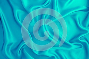 Wave light blue silk or satin fabric background