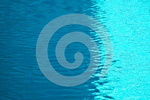 wave moving by wind on water surface of swimming pool