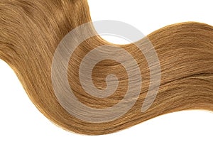 Wave of natural brown hair on white background