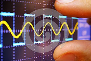 Wave on oscilloscope photo