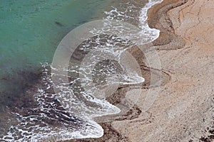 Wave patterns in the sand