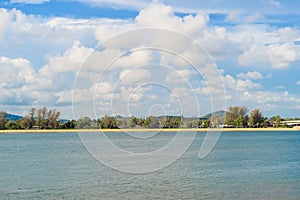 Wave at Phuket beach, Andaman Sea at noon in Thailand. Nature sky background