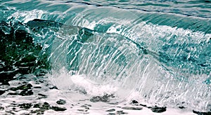 Wave rolling on the pebbels beach