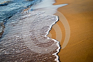 Wave rush ashore by the beach