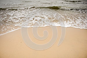 Wave on the sand beach