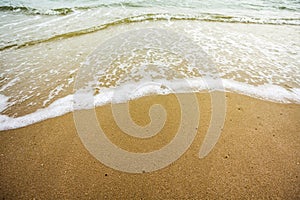 Wave on the sand beach