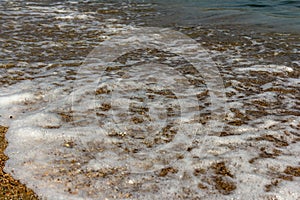 Wave on the sand beach.