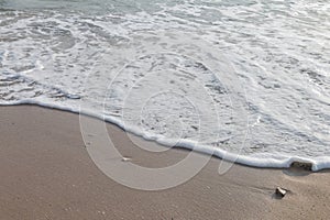 Wave on the sand beach