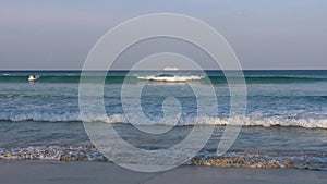 Wave on a sandy beach at south shore of Phuket island, Thailand