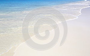 Wave of the sea on the sand beach