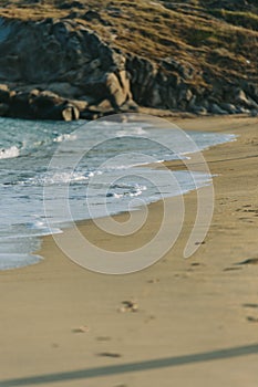 Wave of the sea on the sand beach