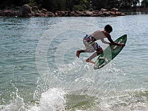 Wave skim board surfing