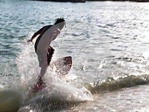 Wave skim boarding