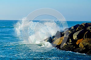 Wave Smashing in a Sprial off a Jetty