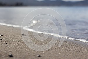 Wave splash sea beach macro, close up, Close up of sea foam and wet sand