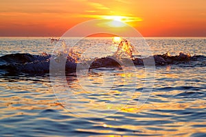 Wave Splash at Sunset on Lake Michigan