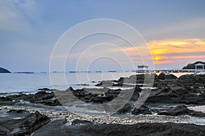 Wave splash to the rock in the early morning