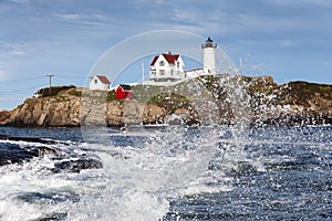 Wave Splashess Near Cape Neddick (Nubble) Lighthouse in Maine