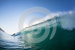 Wave Surfer Behind Crashing Water Swimming