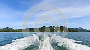 Wave of trace tail of speed boat on water surface.