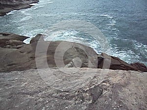 Waves against rocks, Guaruja, Sao Paulo, Brazil