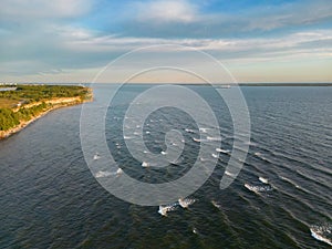 Waves in the Baltic Sea near the Paldiski cliff, photo from a drone on a summer day