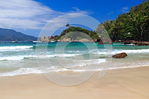 Waves on beach Aventueiro of island Ilha Grande, Brazil photo