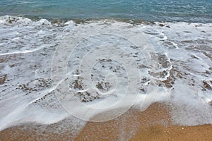 waves on the beach of kuta bali