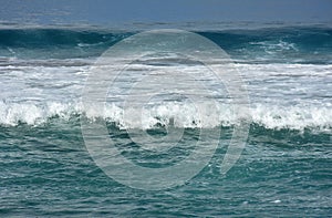 waves on the beach of kuta bali