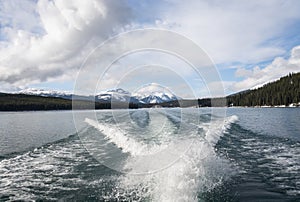Waves behind boat on Maligne Lake, Jasper National Park. Canadian Rockies