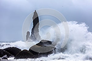 Waves on the black beach of Reynisfjara in Iceland