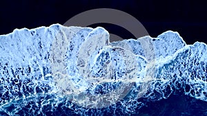 Waves on black sand. photo