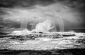 Waves breaking at Anglesea beach in Victoria, Australia