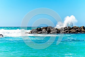 Waves breaking on the barriers of the lagoons at the resort community of Ko Olina