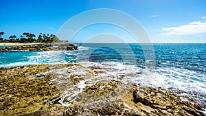 Waves breaking on the barriers of the lagoons at the resort community of Ko Olina