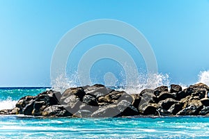 Waves breaking on the barriers of the lagoons at the resort community of Ko Olina