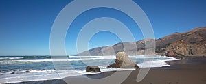 Waves breaking into bay at original Ragged Point at Big Sur on the Central Coast of California United States