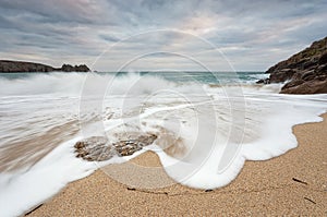 Waves breaking on beach