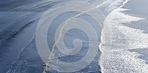 Waves breaking on beach