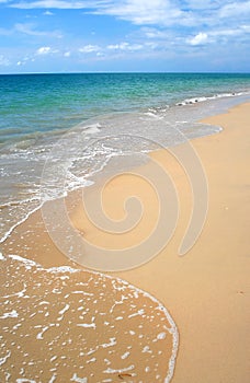 Waves breaking on beach