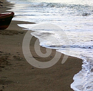 Waves breaking on beach