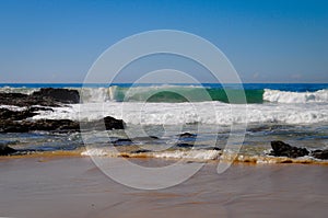 Waves breaking on beach, Valla Beach, NSW, Australia photo
