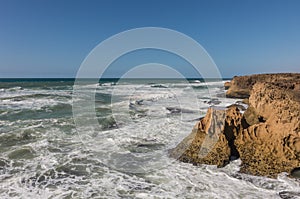 Waves breaking of cliffs near Oualidia lagoon in same name vill