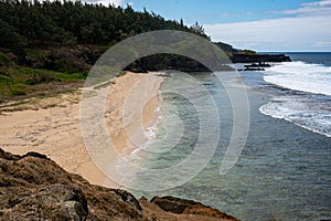 Waves breaking on Gris Gris Beach, Souillac, Mauritius photo