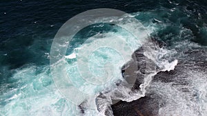 Waves breaking on rocks