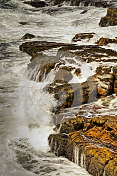 Waves breaking on rocks