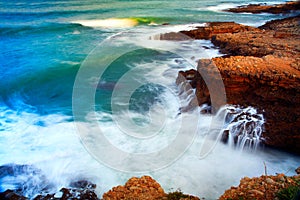 Waves breaking on the rocks