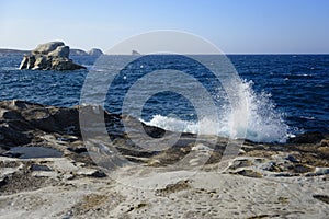 Waves breaking on rocky beach