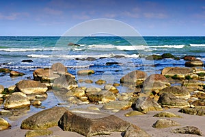 Waves breaking on rocky beach