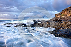 Waves breaking on rocky coast